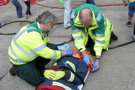 Patient on spinal board at Evesham